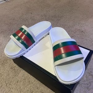 White Gucci web flip flops